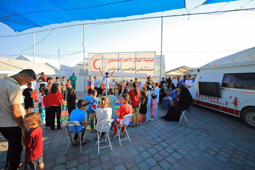 Support for children at the Palestine Red Crescent Society field hospital in Al-Mawasi, Gaza Strip.