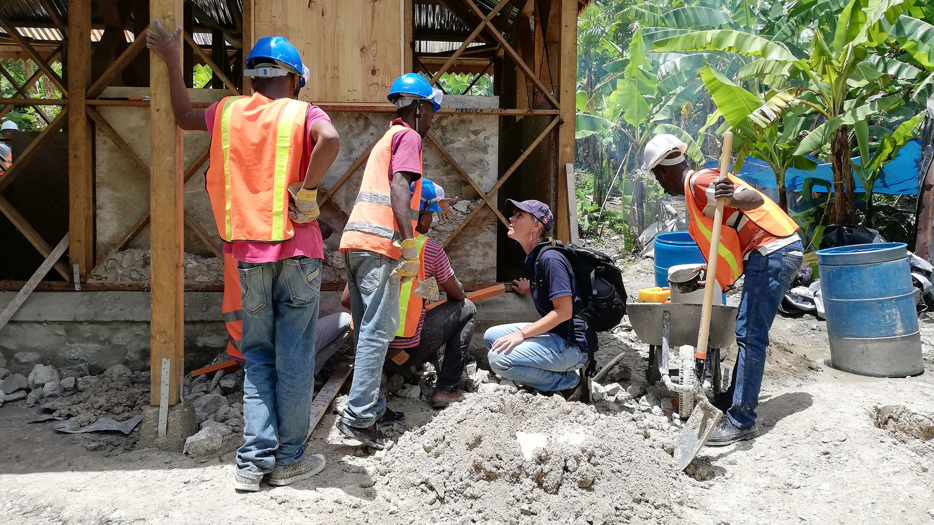 An Swiss Humanitarian Aid Unit team at work rebuilding a house in Haiti after a tropical storm.