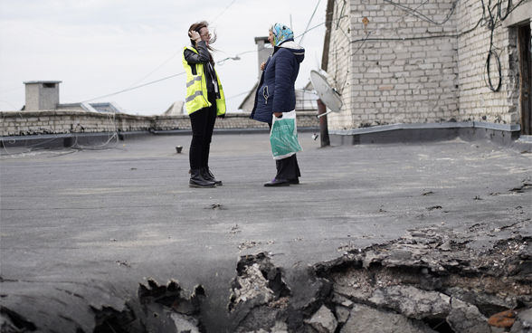 Speaking with a resident of Kharkiv, Tatiana, whose apartment building was heavily shelled.
