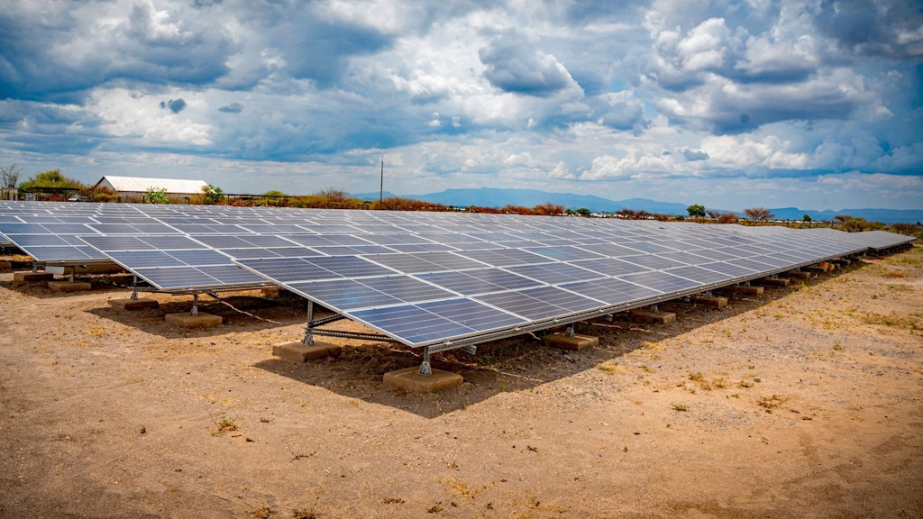 A solar power plant on barren land.